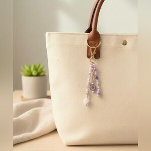 Chic Gold and Purple Beaded Bag Charm Keychain with Floral Detail